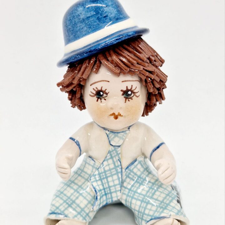 Boy with blue hat