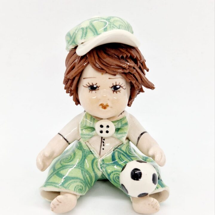 Footballer in green