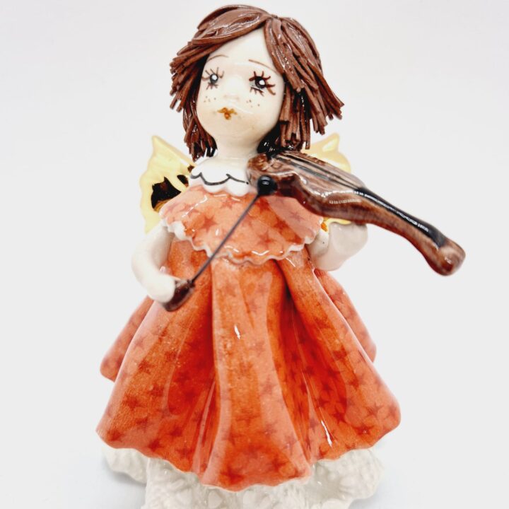 Doll playing violin